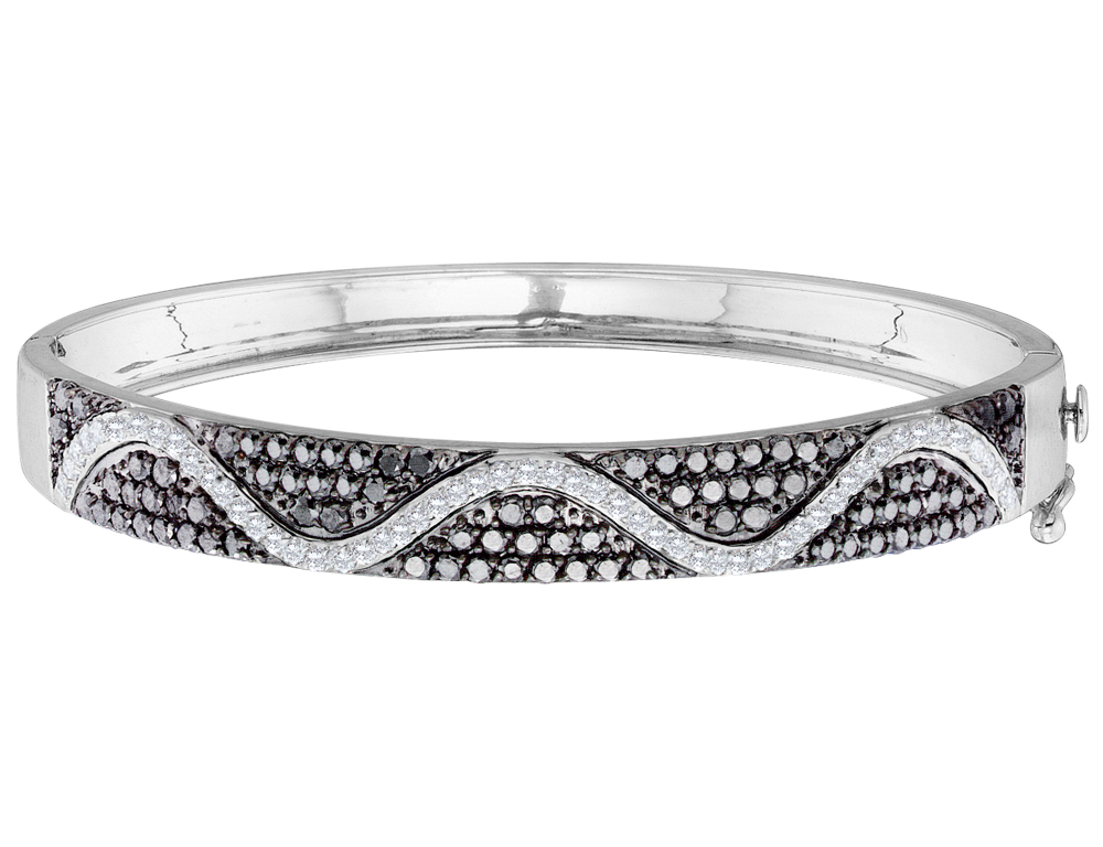 A backdrop of eight-two enthralling black diamonds enhances the light of fifty-four glimmering white diamonds claw set in a curving ribbon. Crafted from 14 karat polished white gold, this stunning 2.50 (ctw) bracelet combines the brilliance of round brilliant cut white and black stones.