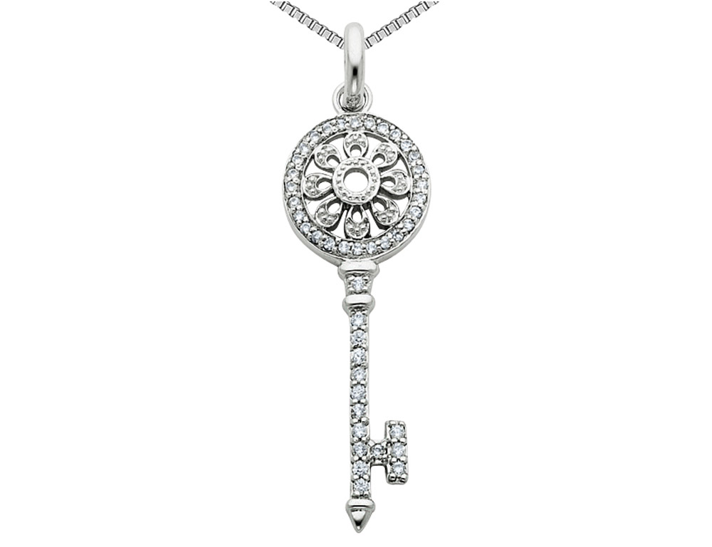Sparkling cubic zirconias and sleek sterling silver combine to form a truly exceptional and unique style in this silver key pendant and 18 inch chain. Part of the Gem & Harmony Signature Keys Collection.