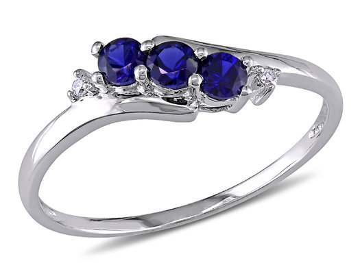 2/5 Carat (ctw) Lab-Created Blue Sapphire Three Stone Ring in 10K White Gold with Accent Diamonds