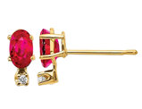 2/3 Carat (ctw) Ruby Post Earrings in 14K Yellow Gold with Accent Diamonds