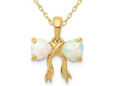1/2 Carat (ctw) Lab Created Opal Bow Ribbon Pendant Necklace in 14K Yellow Gold  with Chain