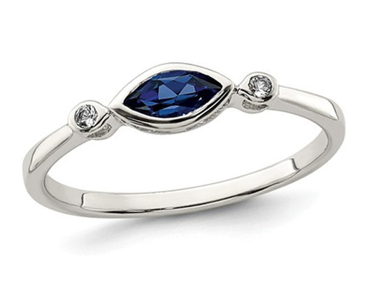 3/10 Carat (ctw) Lab-Created Sapphire Ring in Sterling Silver with White Topaz