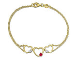 1/6 Carat (ctw) Lab-Created Ruby Triple Heart Bracelet in Yellow Sterling Silver (7.25 Inches)